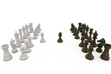 Wooden chess pieces facing off 