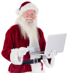 Santa pays with credit card on a laptop