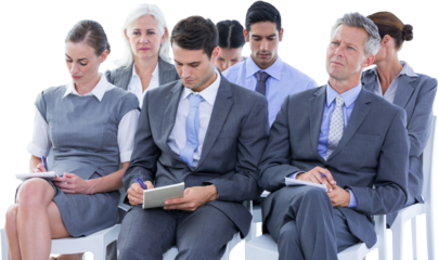 Business team taking notes during conference
