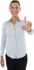 Fototapeta premium Female executive pressing an invisible virtual screen