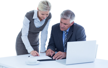 Businessman with secretary checking diary 