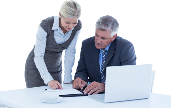 Businessman with secretary checking diary 