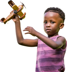 Child holding wooden airplane