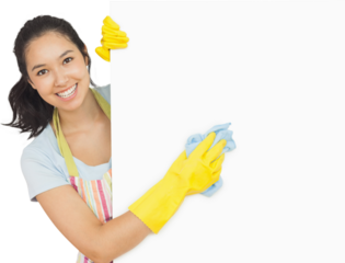 Cheerful woman cleaning white surface