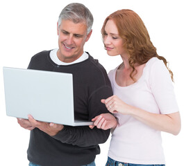 Casual couple using laptop together