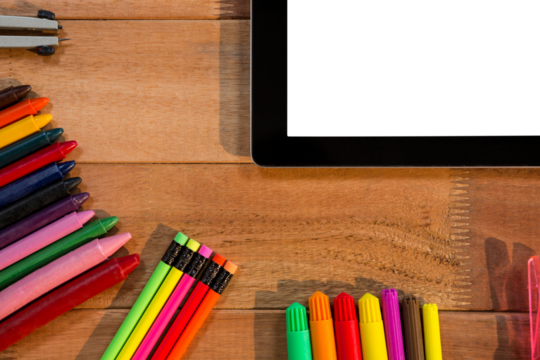 Digital tablet with various stationery - Powered by Adobe