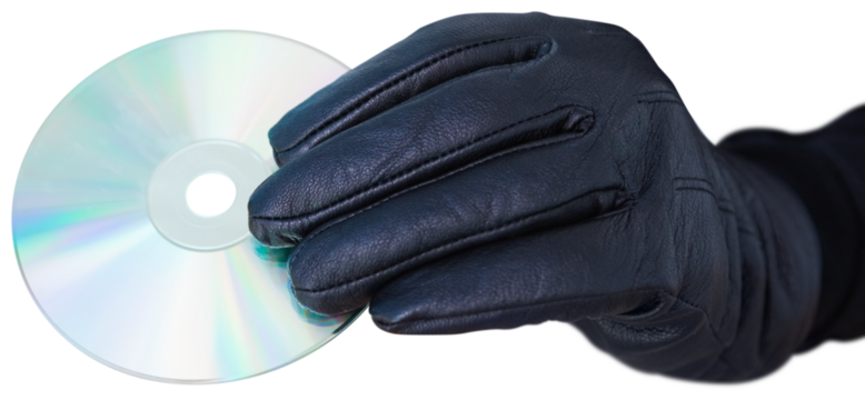 Burglar with sunglasses typing on keyboard