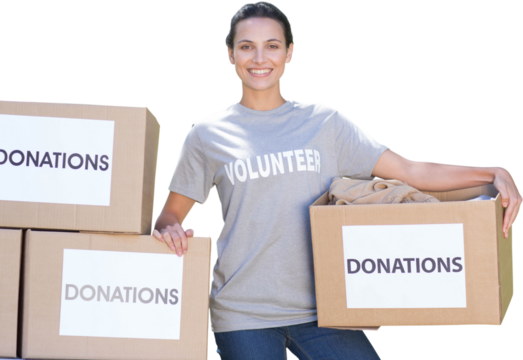 Pretty volunteer holding a donation box in park