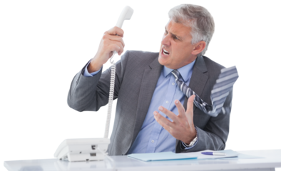 Irritated businessman holding telephone