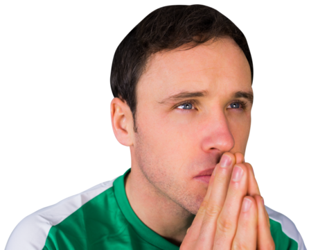 Nervous football fan in green - Powered by Adobe