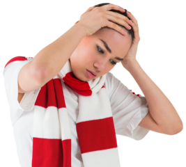 Disappointed football fan looking down
