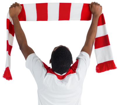 Happy football fan waving scarf - Powered by Adobe