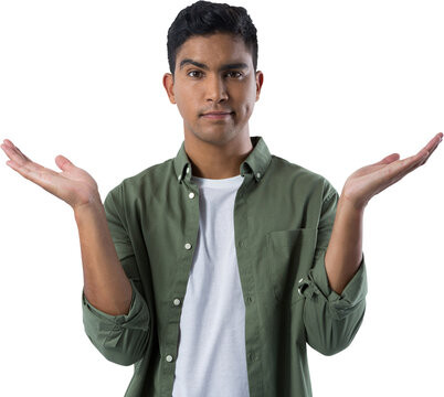 Frowning man gesturing against white background