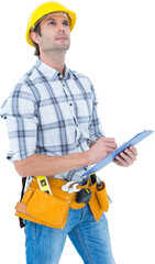 Handsome architect writing notes on clip board