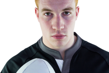 Midsection of rugby player holding ball