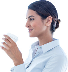 Smiling businesswoman holding disposable cup