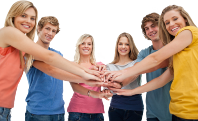 Low angle shot of friends smiling and looking at the camera