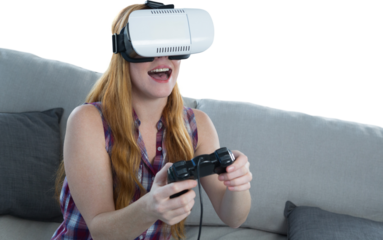 Woman playing video game with virtual reality headset