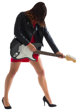 Brunette in biker jacket playing guitar