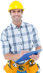 Happy architect writing notes on clip board