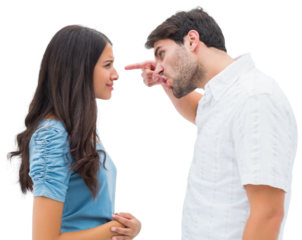 Angry man shouting at upset girlfriend