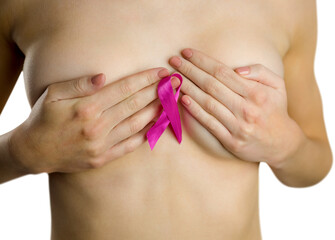 Naked woman with pink ribbon covering breast 