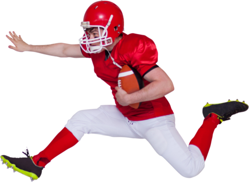 American football player jumping with the ball