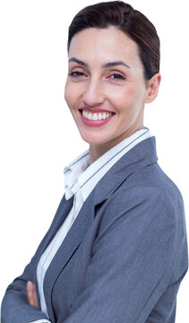 Portrait of smiling businesswoman standing arms crossed