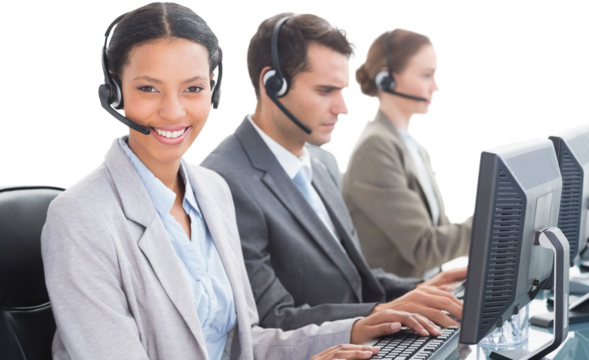Business people with headsets using computers 