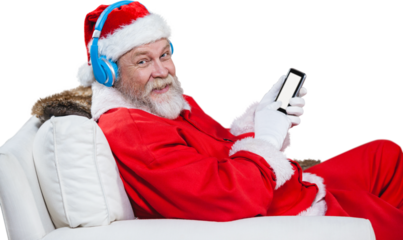 Santa Claus with headphones using mobile phone