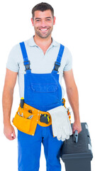 Happy workman in overalls holding toolbox