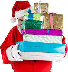 Santa Claus hiding behind Christmas presents