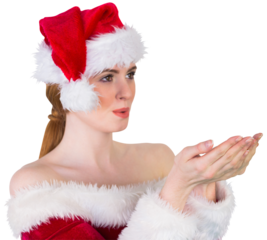 Pretty girl in santa costume holding hand out