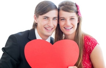 Cute geeky couple smiling and holding heart