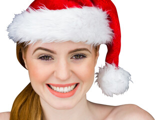 Fototapeta premium Pretty girl in santa costume smiling at camera