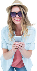 Smiling woman texting with her smartphone 