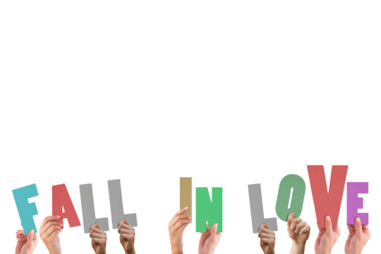 Cropped hands holding colorful words fall in love 