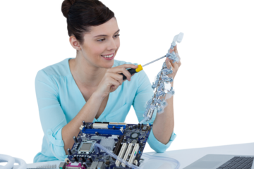Female computer engineer repairing computer motherboard