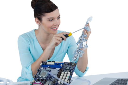 Female computer engineer repairing computer motherboard