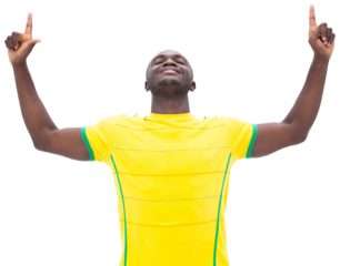 Football player pointing up and smiling