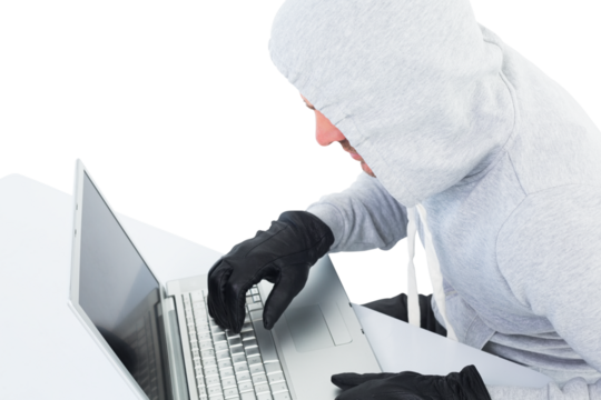 Hacker using laptop to steal identity