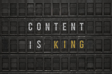 Flip board with text Content Is King