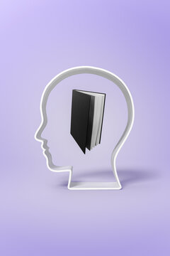 Human head with book on purple backdrop