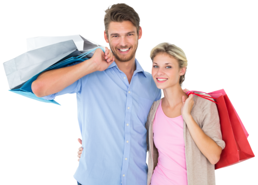 Attractive young couple holding shopping bags
