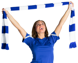 Pretty football fan waving scarf