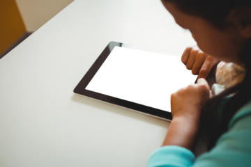 Cropped image of girl using digital tablet