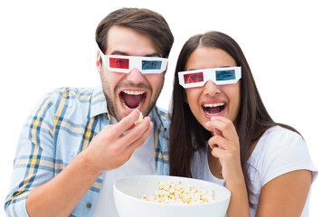 Obraz premium Attractive young couple watching a 3d movie