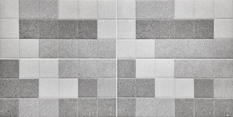 modern grey stylish texture of graphical tile background contains dots, lines, stripes, oblique pattern. repeating geometric tiles, close up view, for interior wall and floor finishing.