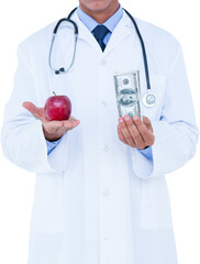 Male doctor holding red apple and banknote