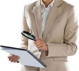 Businesswoman looking at document through magnifying glass